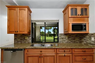 11477 Longshore Way W, Naples, FL 34119 - Photo 9