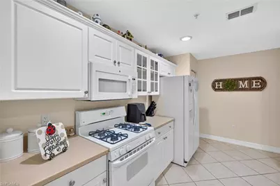 1672 Tarpon Bay Dr S #102, Naples, FL 34119 - Photo 9