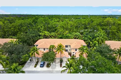 1672 Tarpon Bay Dr S #102, Naples, FL 34119 - Photo 1