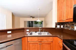 8585 Athena Ct, Lehigh Acres, FL 33971 - Photo 9