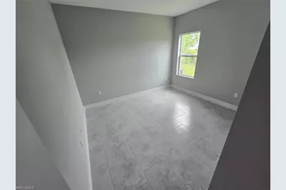 1021 Alcalde St E, Lehigh Acres, FL 33974 - Photo 9
