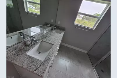1021 Alcalde St E, Lehigh Acres, FL 33974 - Photo 11