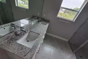 1021 Alcalde St E, Lehigh Acres, FL 33974 - Photo 11