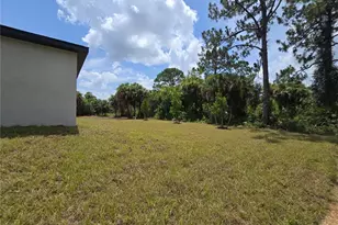 1021 Alcalde St E, Lehigh Acres, FL 33974 - Photo 27