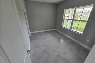 1021 Alcalde St E, Lehigh Acres, FL 33974 - Photo 23