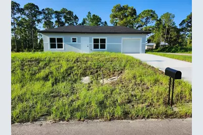 1104 Capri St E, Lehigh Acres, FL 33974 - Photo 1