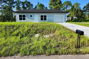 1104 Capri St E, Lehigh Acres, FL 33974 - Photo 1
