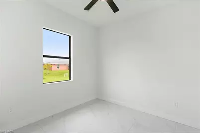 744 Oakridge Ave S, Lehigh Acres, FL 33974 - Photo 19