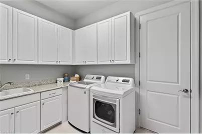 8677 Dilillo Ct, Naples, FL 34119 - Photo 25