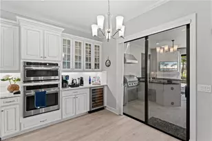 8677 Dilillo Ct, Naples, FL 34119 - Photo 9