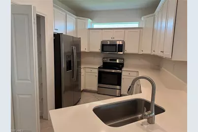 9093 Leatherwood Loop, Lehigh Acres, FL 33936 - Photo 11