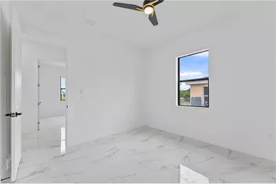 548 Long Island St E, Lehigh Acres, FL 33974 - Photo 27