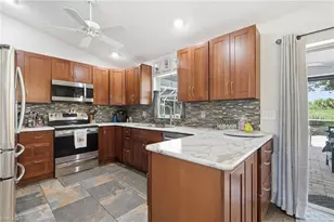 1529 Crestwood Cir W, Lehigh Acres, FL 33936 - Photo 11