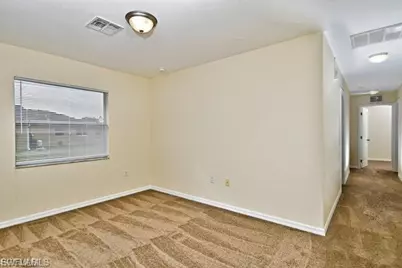 1062 Countess Ave, Lehigh Acres, FL 33974 - Photo 3