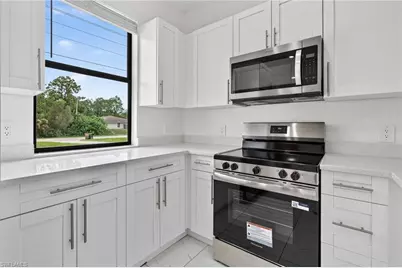 909/911 Homestead Rd S, Lehigh Acres, FL 33974 - Photo 17