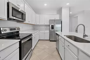 9156 Leatherwood Loop, Lehigh Acres, FL 33936 - Photo 11