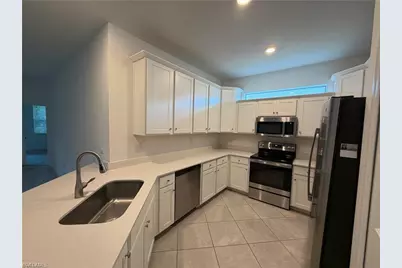 9077 Leatherwood Loop, Lehigh Acres, FL 33936 - Photo 13