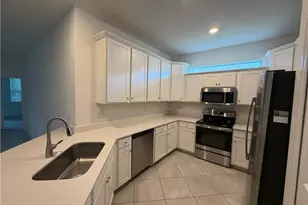 9077 Leatherwood Loop, Lehigh Acres, FL 33936 - Photo 13