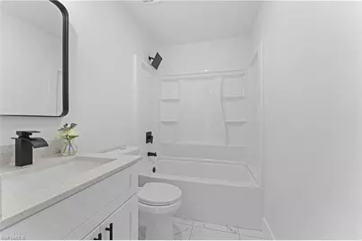 909 Grant Blvd, Lehigh Acres, FL 33974 - Photo 5