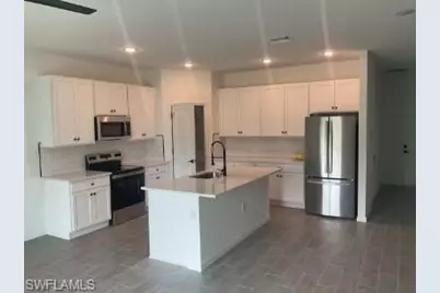 715 Homer Ave S, Lehigh Acres, FL 33973 - Photo 3