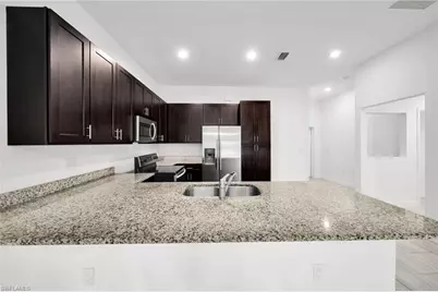 318 SW 7th Ter, Cape Coral, FL 33991 - Photo 7