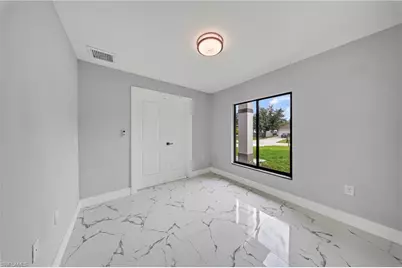 738 Sunrirse Blvd, Lehigh Acres, FL 33974 - Photo 15