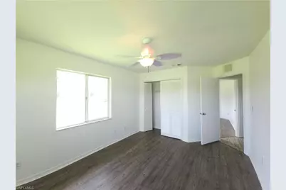 561 Foxcreek Dr, Lehigh Acres, FL 33974 - Photo 29