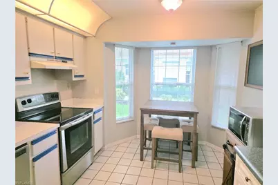 1921 Golfside Village Dr, Lehigh Acres, FL 33936 - Photo 15