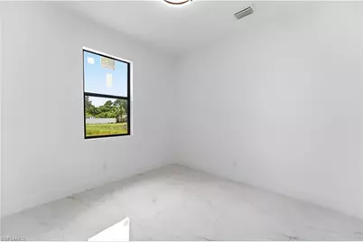 3011 23rd St SW, Lehigh Acres, FL 33976 - Photo 21