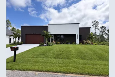 835 Harnes Ave S, Lehigh Acres, FL 33974 - Photo 1