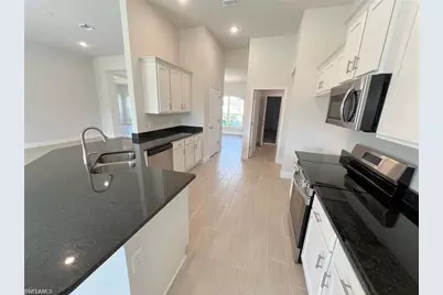 410 SE 1st Ter, Cape Coral, FL 33990 - Photo 5
