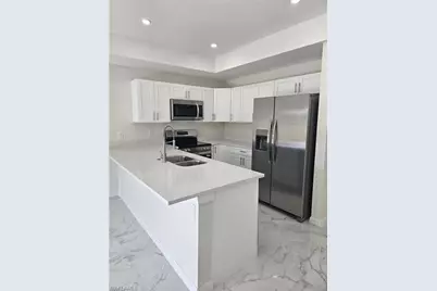 399 Carrillon Ave S, Lehigh Acres, FL 33974 - Photo 5