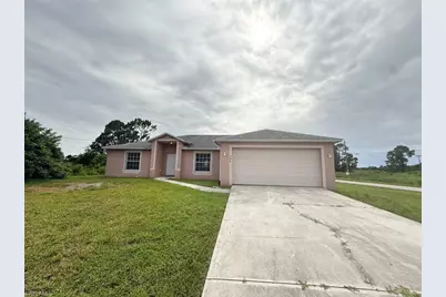 706 Oro Ave S, Lehigh Acres, FL 33974 - Photo 1