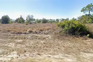 1226 Ecarte St E, Lehigh Acres, FL 33974 - Photo 1