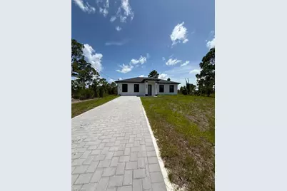 932 Dempsey St, Lehigh Acres, FL 33974 - Photo 1