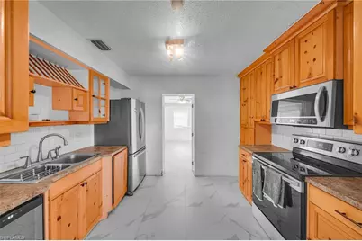 302 E Penn Rd, Lehigh Acres, FL 33936 - Photo 15