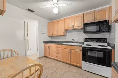 16 Dawn Flower Cir, Lehigh Acres, FL 33936 - Photo 11