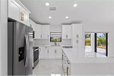 927 NE 32nd Ter, Cape Coral, FL 33909 - Photo 9