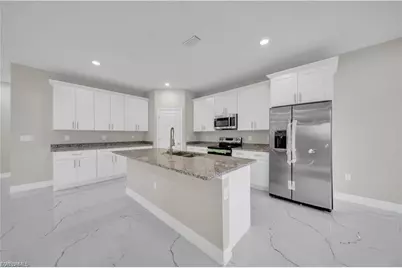 543 McArthur Blvd, Lehigh Acres, FL 33974 - Photo 19