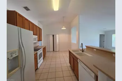 1014 NW 31st Pl, Cape Coral, FL 33993 - Photo 9