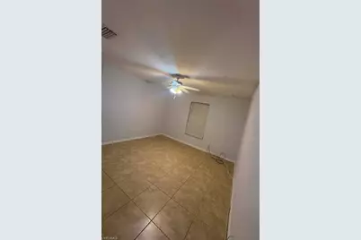1002 W 12th St, Lehigh Acres, FL 33972 - Photo 9