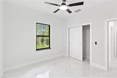 2818 13th St SW, Lehigh Acres, FL 33976 - Photo 7