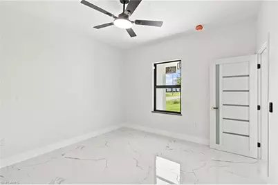 2818 13th St SW, Lehigh Acres, FL 33976 - Photo 13