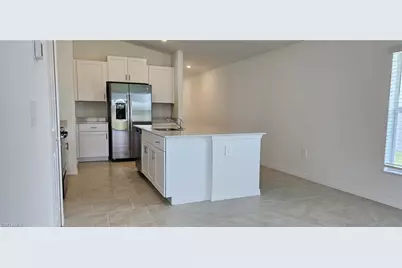 20190 Caroline Creek Pl, Lehigh Acres, FL 33974 - Photo 13