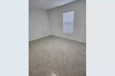 20190 Caroline Creek Pl, Lehigh Acres, FL 33974 - Photo 19