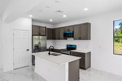 2810 73rd St W, Lehigh Acres, FL 33971 - Photo 7