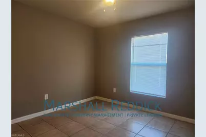 202 Homer Ave S, Lehigh Acres, FL 33973 - Photo 11