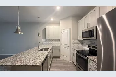 4745 26th St SW, Lehigh Acres, FL 33973 - Photo 9