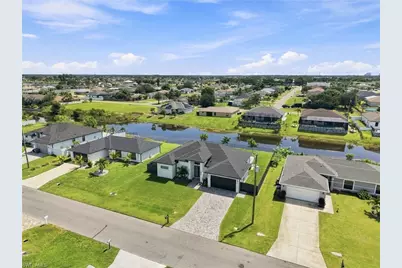 927 NE 13th Pl, Cape Coral, FL 33909 - Photo 37