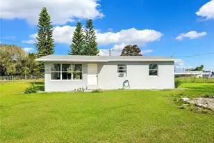 298 6th St NW, Moore Haven, FL 33471 - Photo 1